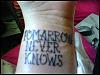 tomarrow-never-knows-misspelled-tattoo.jpg