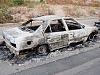 800px-Heavily_Damaged_Car_Beirut_Lebanon_Unrest_5-9-08.jpg
